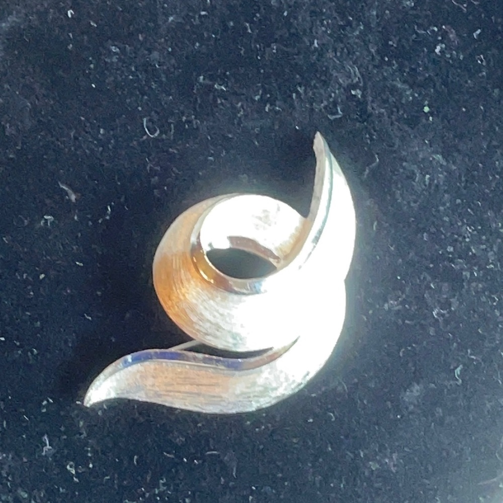 Trifari silver tone swirl brooch